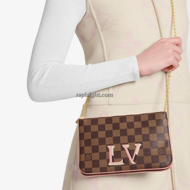 louis-vuitton-double-zip-pochette-damier-ebene-small-leather-goods--N60254_PM1_Worn-view.jpg